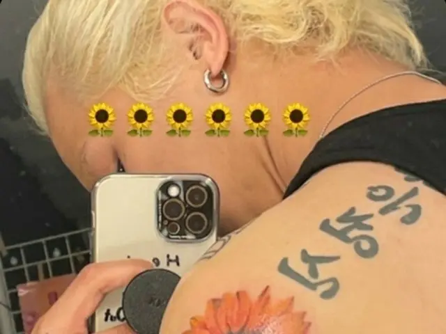 MINO (WINNER), new tattoo is a Hot Topic. Large sunflower tattoo.