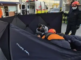 Công dân Hàn Quốc giải cứu một bà nội trợ bị mắc kẹt dưới gầm xe SUV