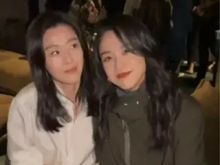 Nữ diễn viên Tang WeiXJun Ji Hyun khoanh tay và tình nhân ở London...Hai bức ảnh của những người đẹp đại diện