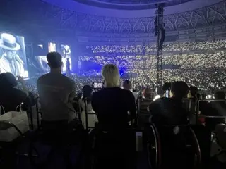 G-DRAGON (BIGBANG) mời các vận động viên khuyết tật Nhật Bản bao gồm vận động viên bơi lội khuyết tật Kota Kubota đến buổi hòa nhạc ở Osaka