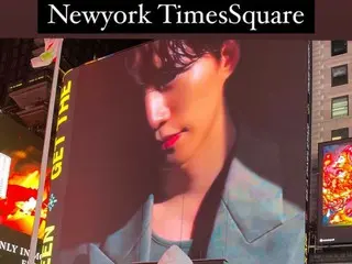 ``2PM'' Junho xác thực biển quảng cáo điện tử tại Quảng trường Thời đại, New York do fan chuẩn bị